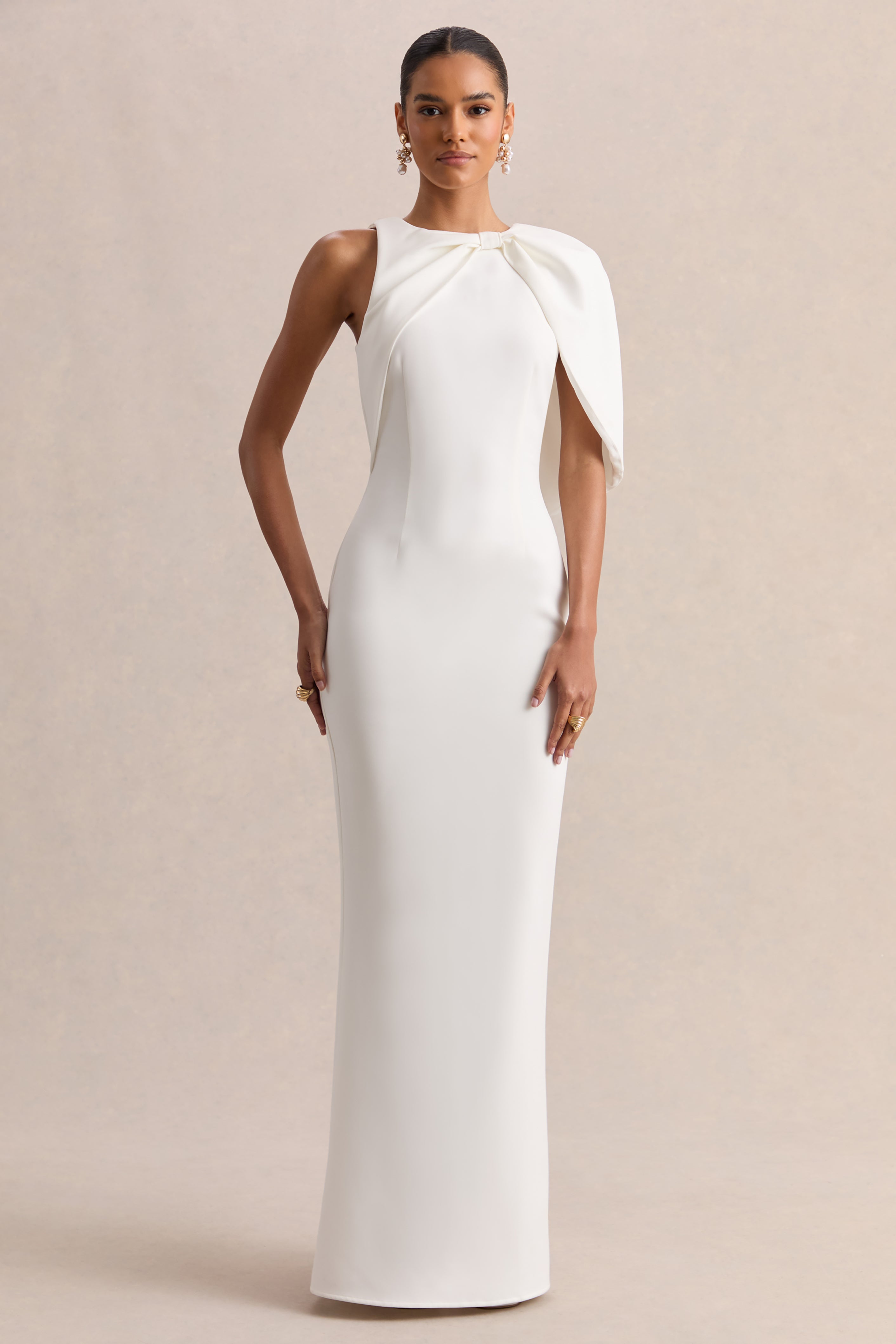 white dress with cape One Shoulder Feather Slit and Flowing Sleeve Walone LLC The minimalist design showcases clean lines and a sleek silhouette LAPOINTE Satin Cape Dress With