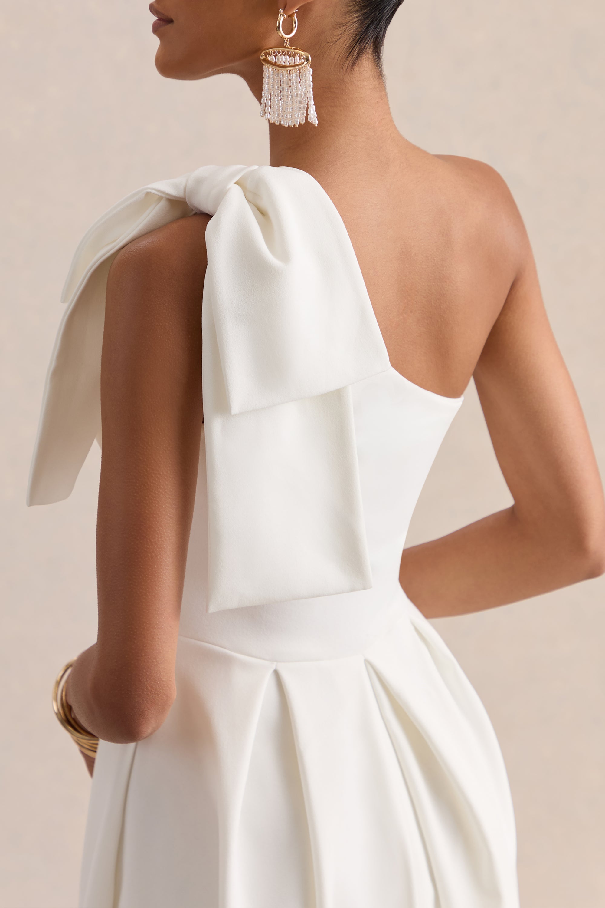 white midi dress with bows Lace midi dress with a velvet bow Color: White RASARIO Online Boutique 34 (FR) / White