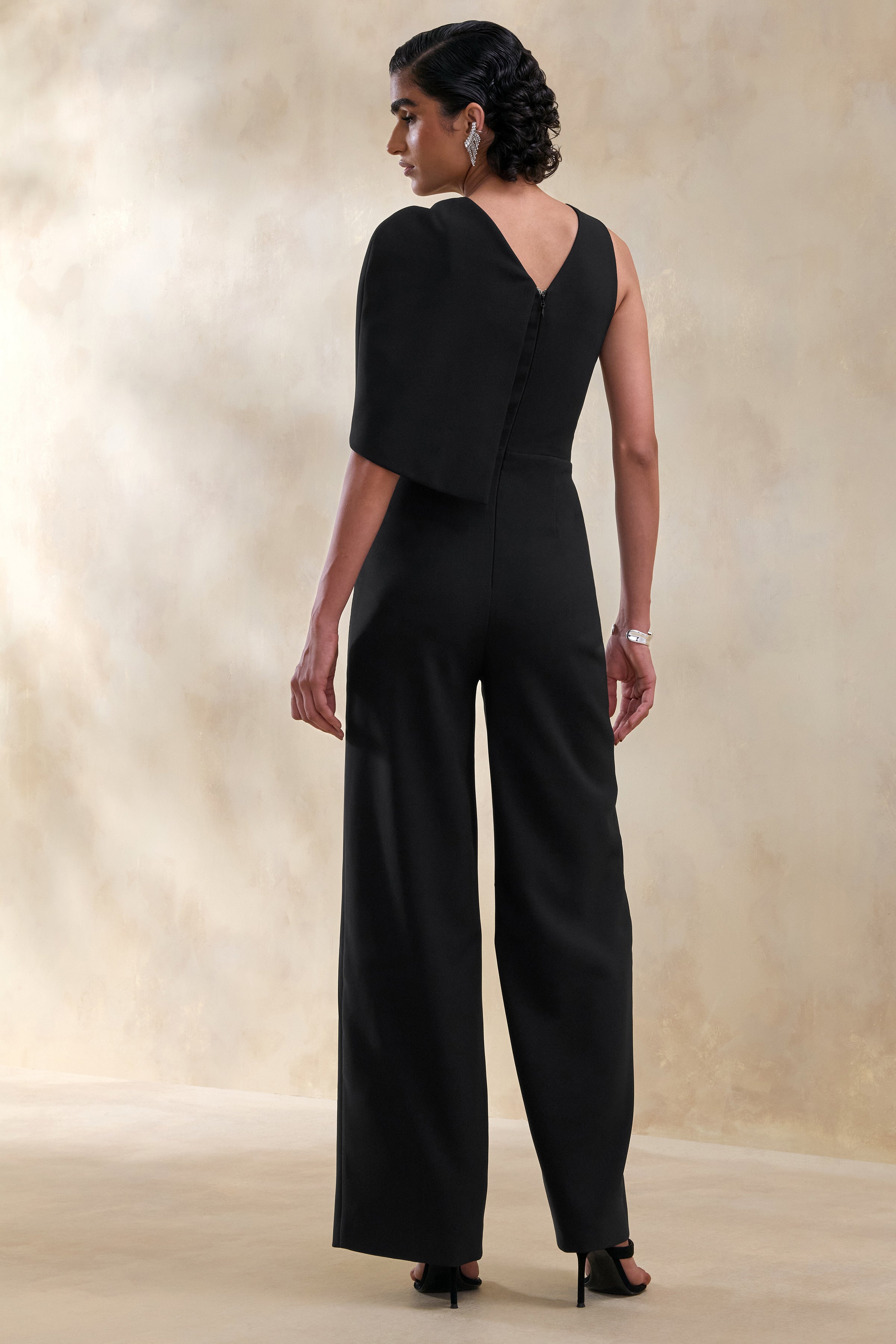Quinley | Black Asymmetric-Neck Jumpsuit With Cape-Sleeve – Club L