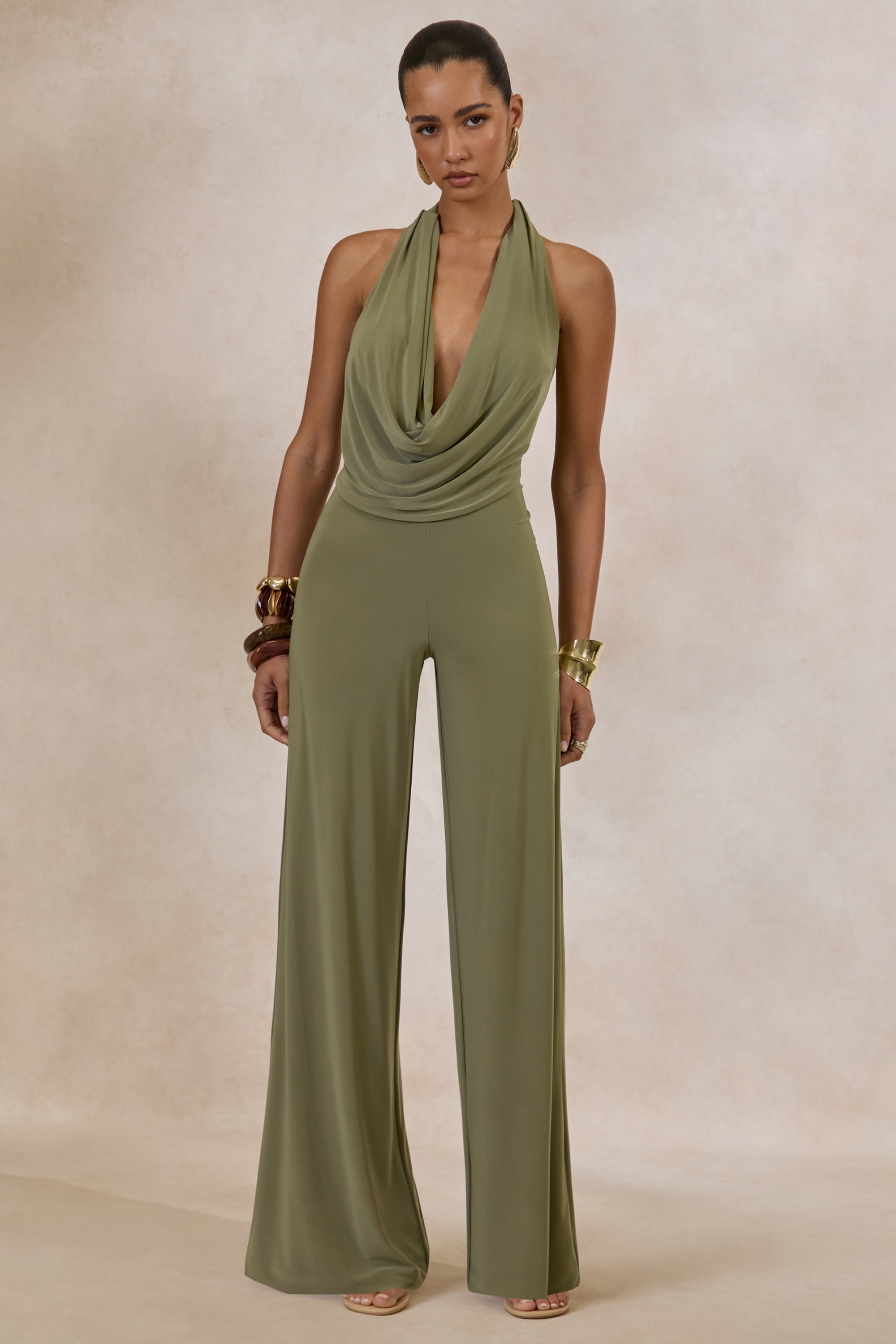 ECM_HR_CL137527037---Clemence-_-Green-Plunge-Neck-Jumpsuit-0.jpg