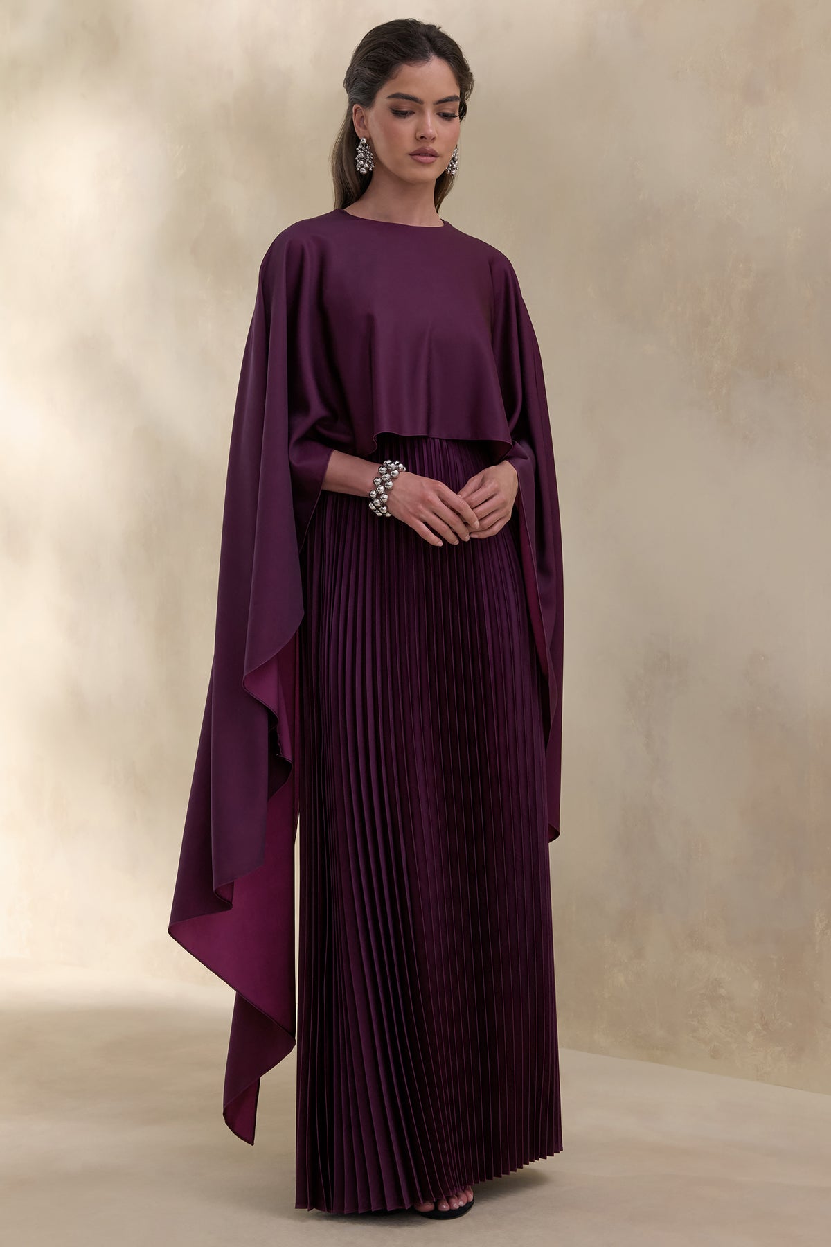 Loradia | Dark PLUM Satin Round-Neck Maxi Dress With Cape-Sleeves And Pleated-Skirt Loradia | Dark PLUM Satin Round-Neck Maxi Dress With Cape-Sleeves And Pleated-Skirt