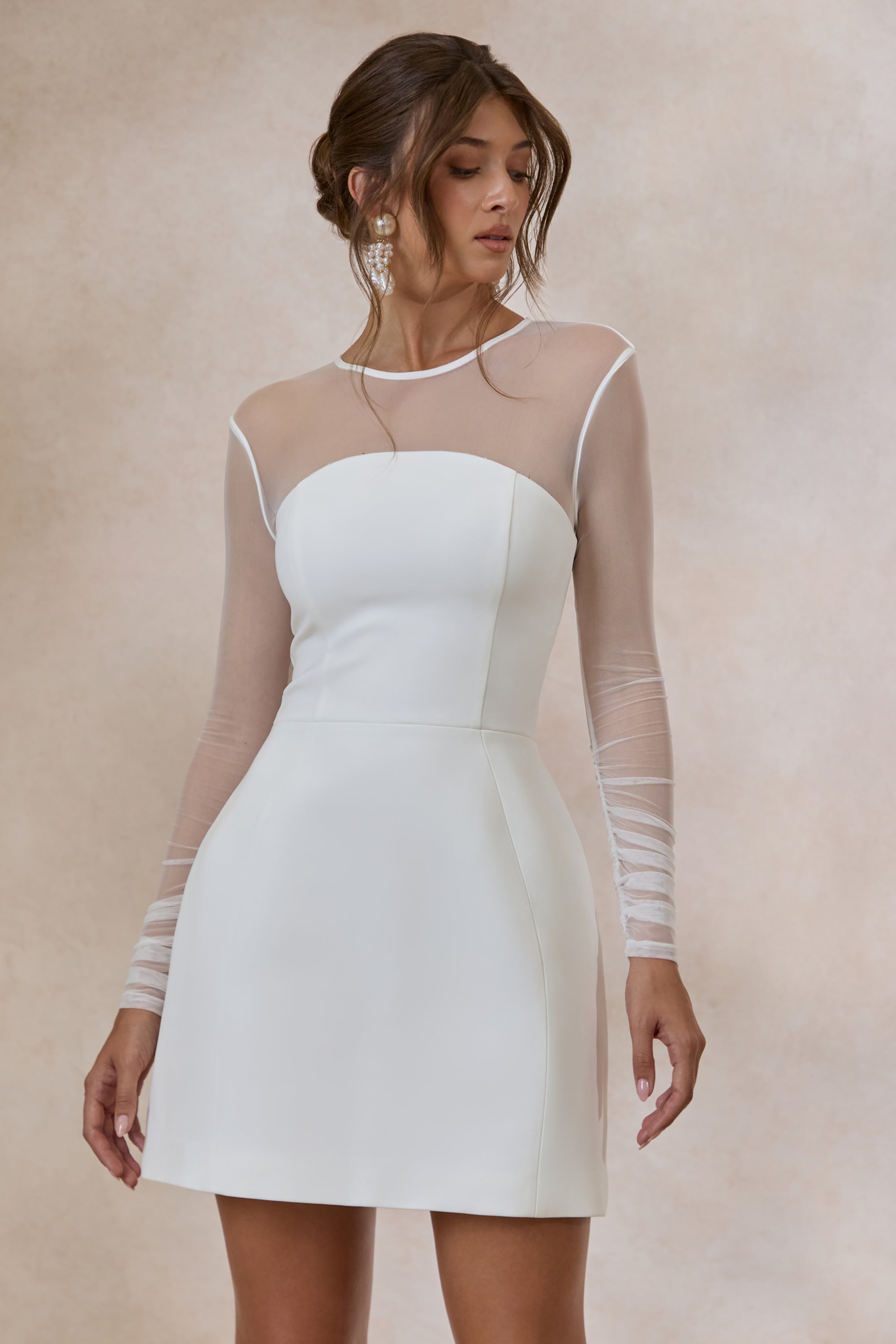 ECM_HR_CL137846110---Unveila-_-White-Crew-Neck-Mini-Dress-With-Mesh-Detailing-4.jpg