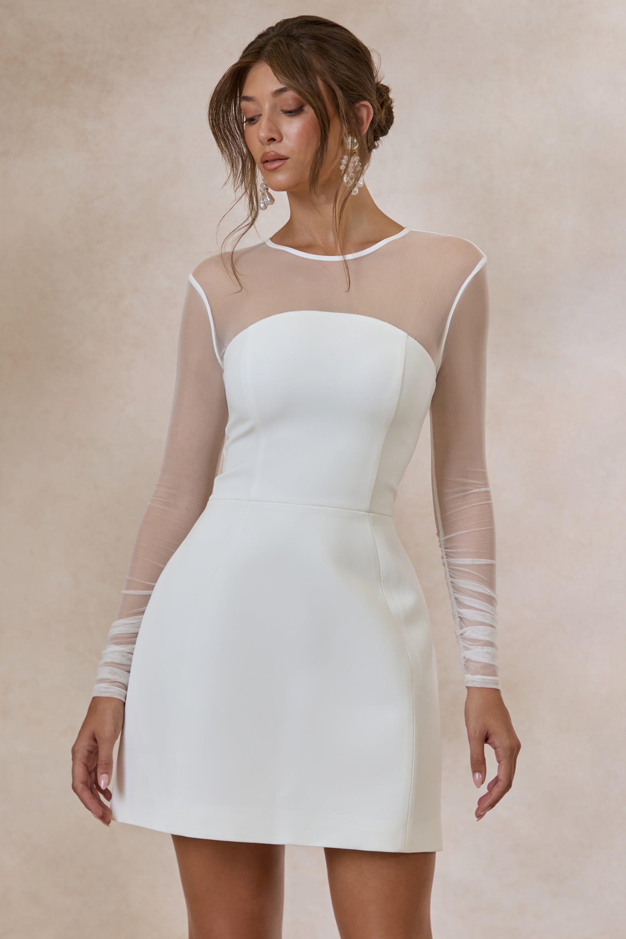 ECM_HR_CL137846110---Unveila-_-White-Crew-Neck-Mini-Dress-With-Mesh-Detailing-5.jpg