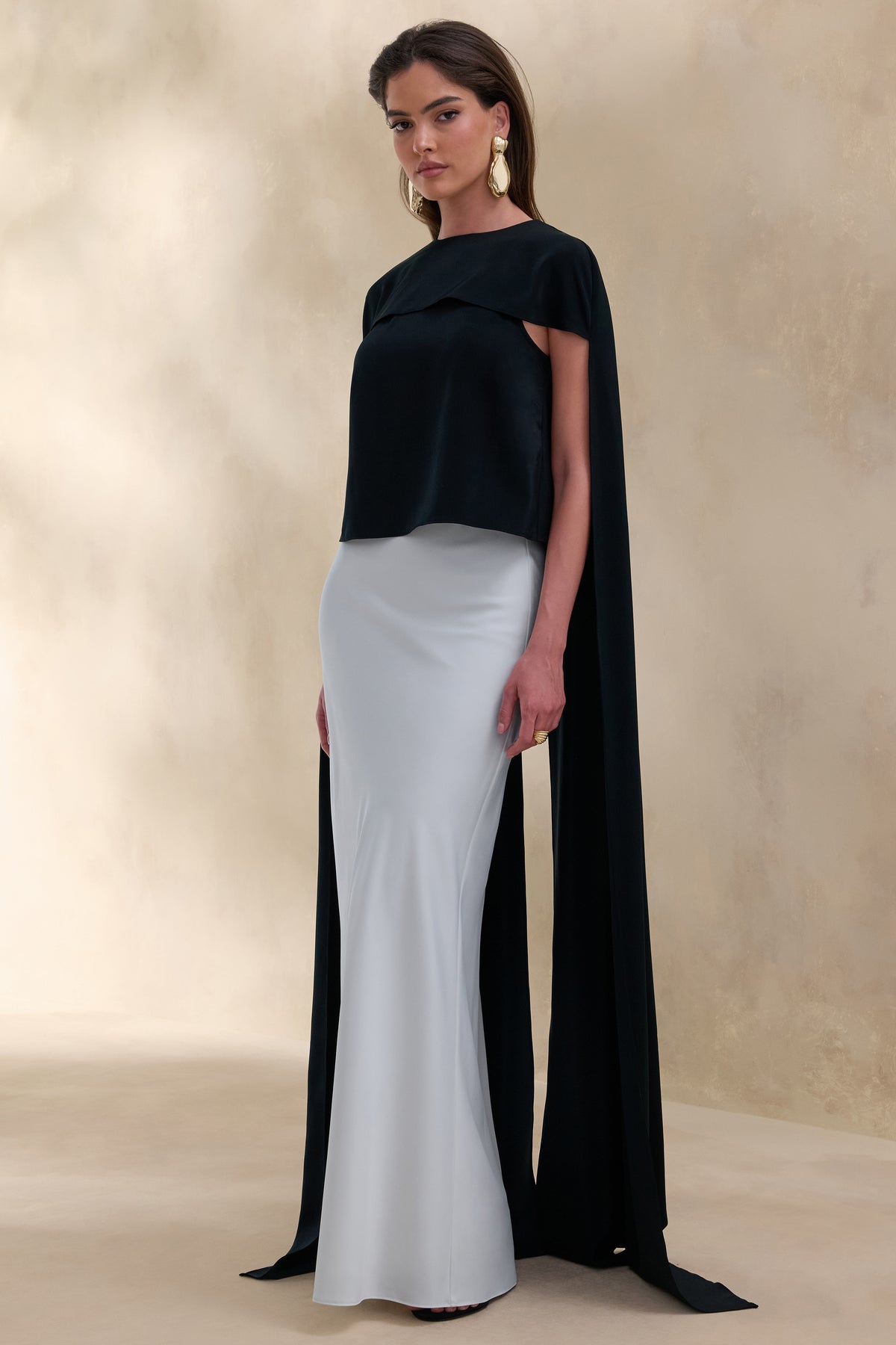 ECM_HR_CL137777001 - Aetheria | Black Satin High-Neck Top With Cape + ECM_HR_CL137855110 - Iveta | White Satin Maxi-Skirt 4.jpg