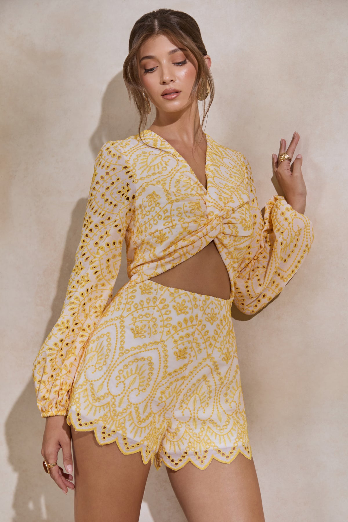 ECM_HR_CL138203121---Ksenia-_-Lemon-and-White-Broderie-Plunge-Neck-Playsuit-With-Twist-Detail4.jpg