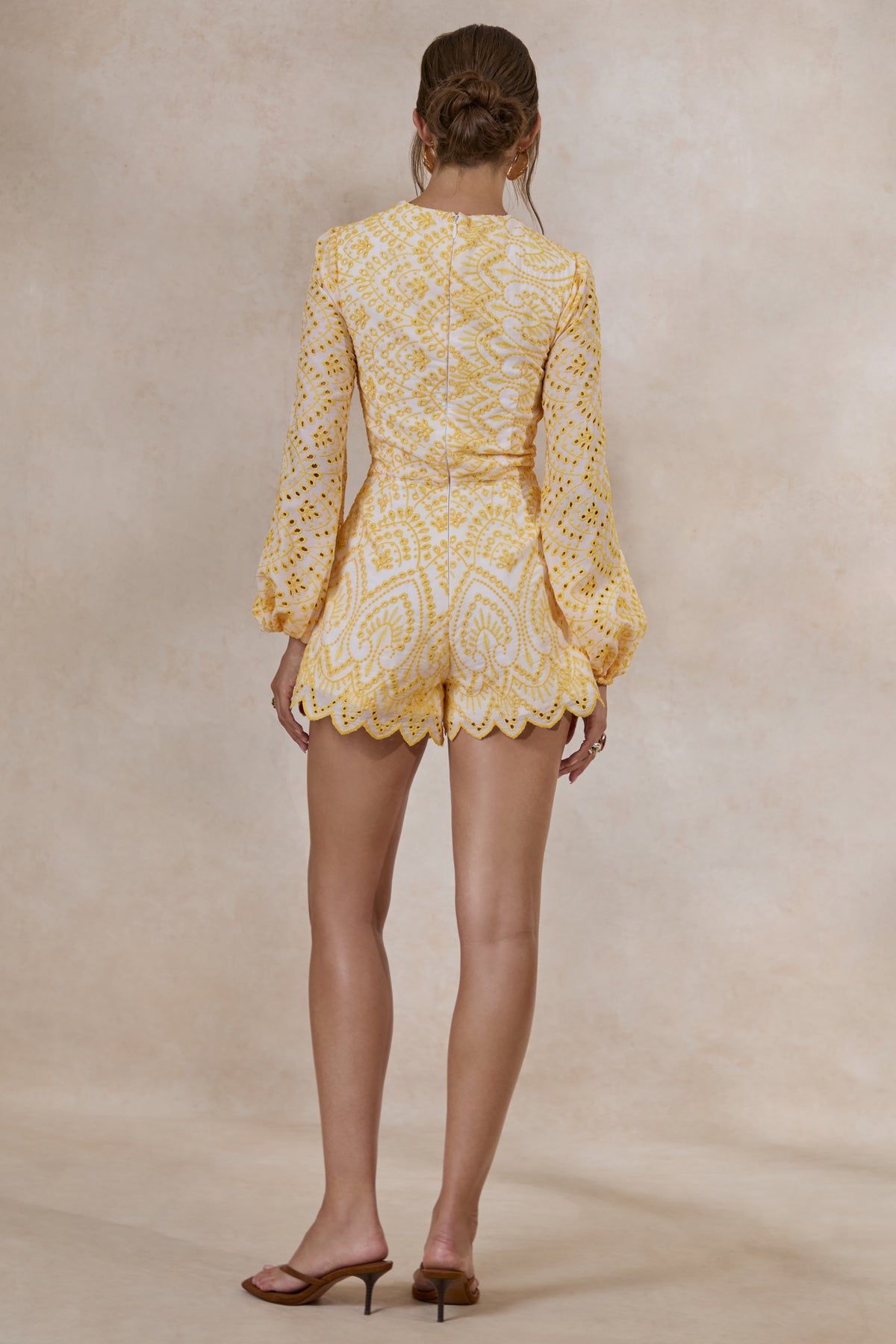 ECM_HR_CL138203121---Ksenia-_-Lemon-and-White-Broderie-Plunge-Neck-Playsuit-With-Twist-Detail5.jpg