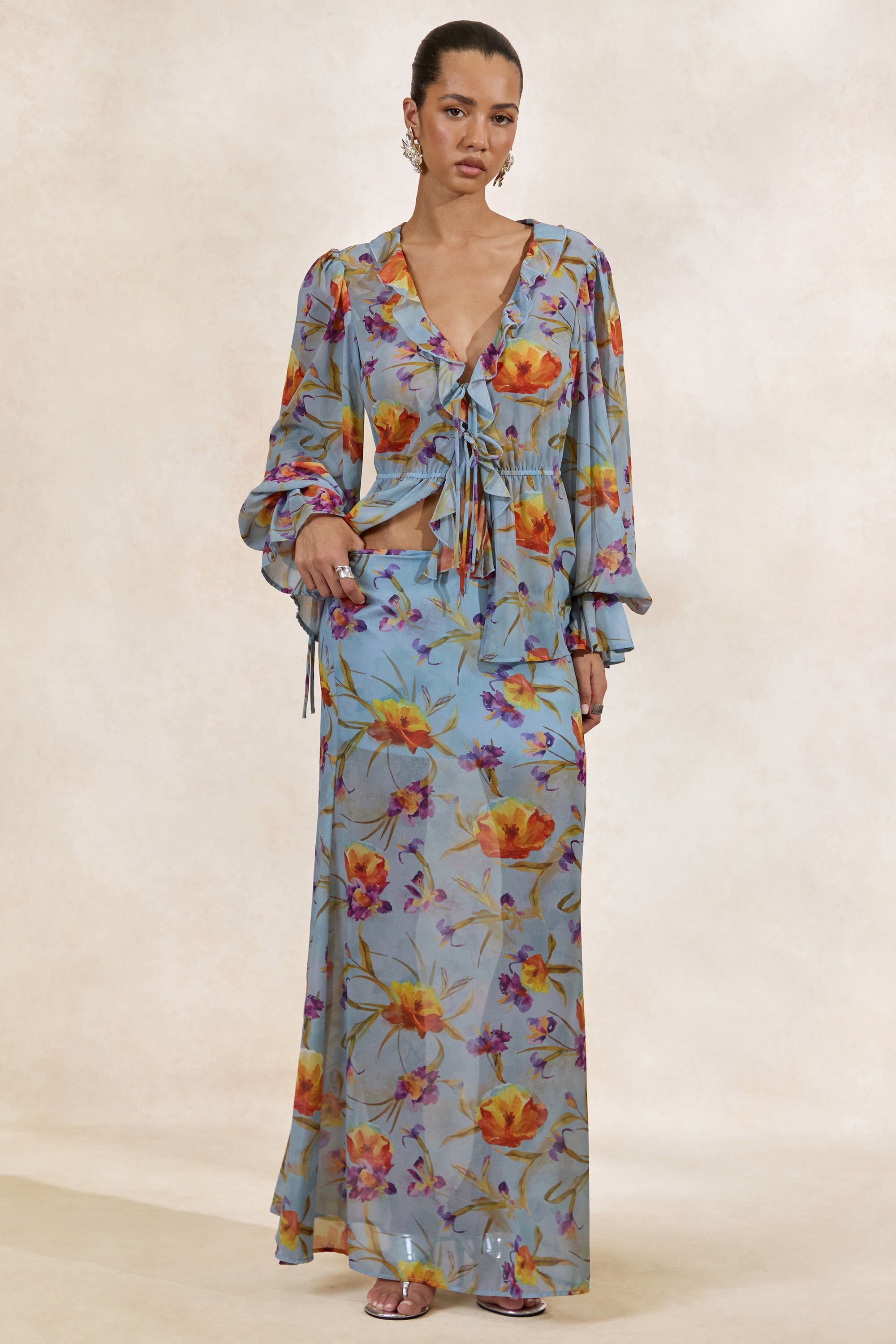 CL138215016 - Alveta _ Blue Floral Chiffon Sheer V-Neck Top With Ruffled Detailing  0.jpg