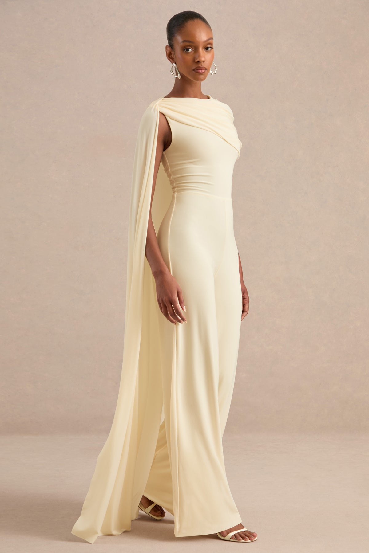 ECM_HR_CL138262111 - Emelisse Cream Round-Neck Jumpsuit With Gathered Detailing And Sash2.jpg