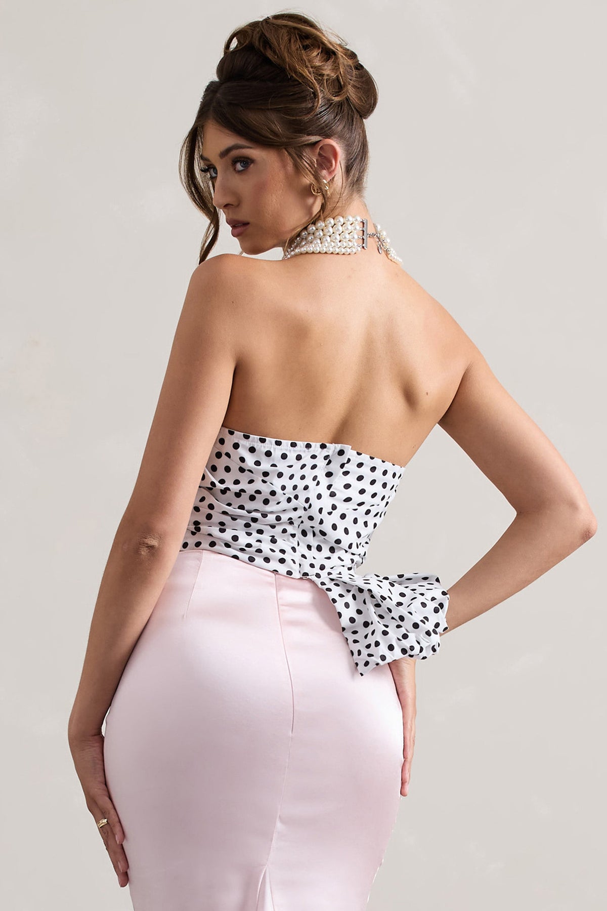 WB_CL132298201-HauteCreamPolkaDotAsymmetricPlunge-NeckCorsetWithRuffle_CL132299008-CouturePinkSatinMaxiSkirt16copy