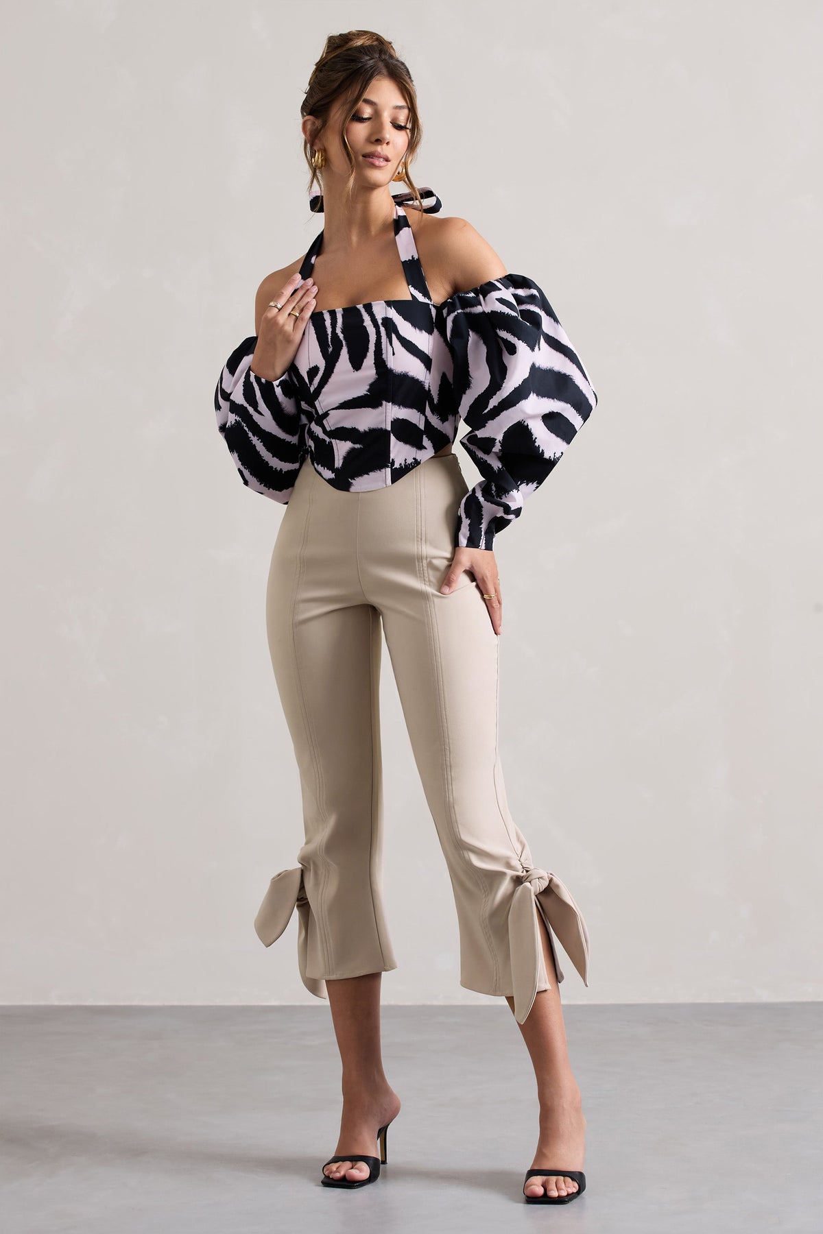 WB_HR_CL132248018-TheatricZebraPrintHalter-NeckCorsetTopWithPuff-Sleeves_HR_CL132253059-OnStageChampagneCroppedCapriPantsWithKnotDetail0